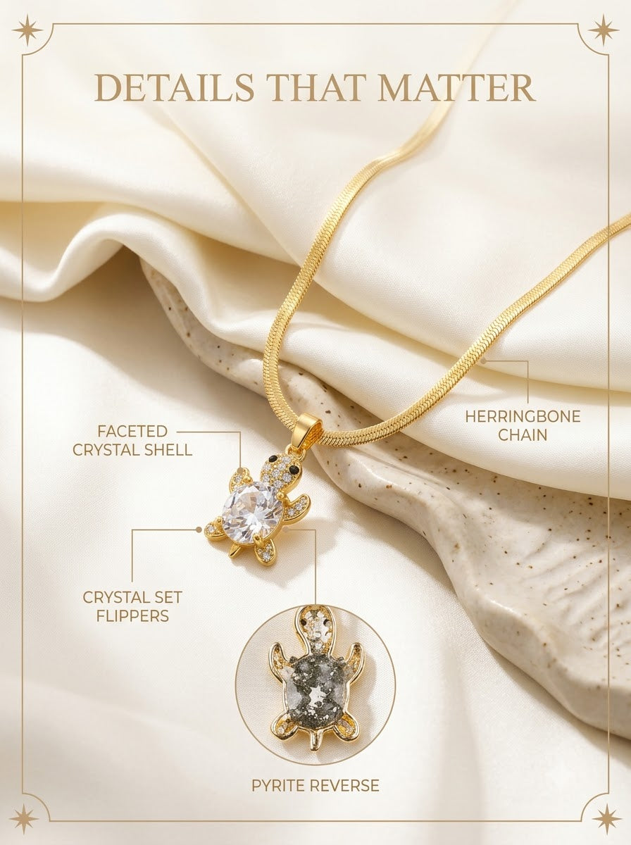 Nacris Turtle Pendant detail: faceted crystal shell, crystal set flippers, pyrite reverse and herringbone chain