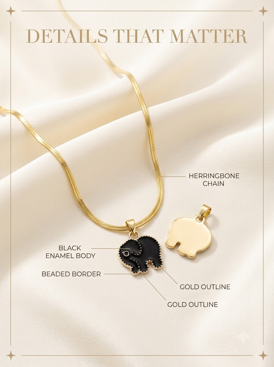 Mithra Elephant Pendant detail: black enamel body, beaded border, gold outline and herringbone chain