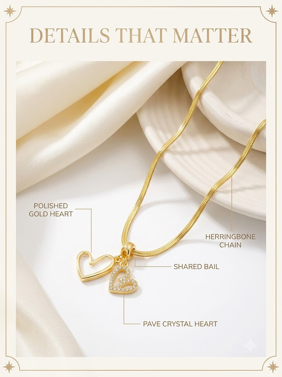 Amoris Twin Heart Pendant detail: polished gold heart, pave crystal heart, shared bail and herringbone chain
