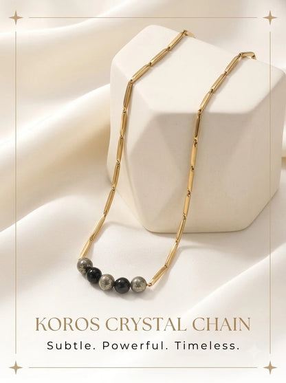 Koros Crystal Chain 24k gold tone rice chain with pyrite and black obsidian beads