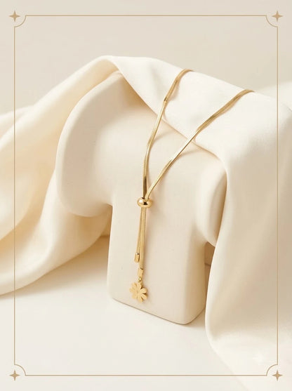 Florelle Lariat 18k gold tone adjustable drop necklace with flower charm
