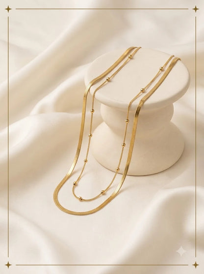 Syrenne Dual Chain layered gold flat snake and beaded satellite necklace