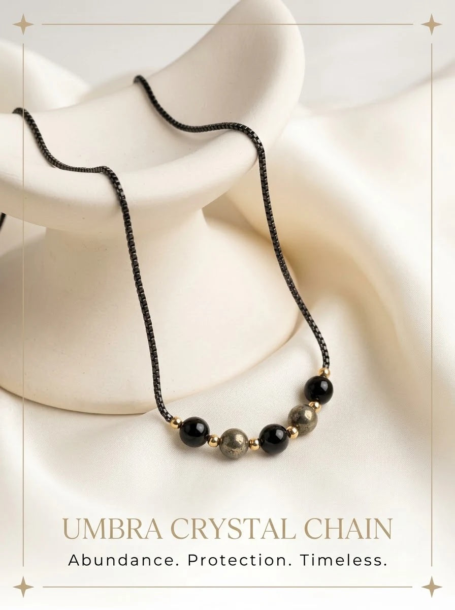 Umbra Crystal Chain black boxer chain with pyrite and black obsidian beads