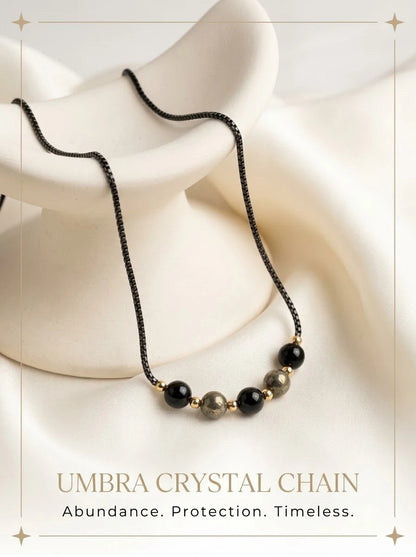Umbra Crystal Chain black boxer chain with pyrite and black obsidian beads
