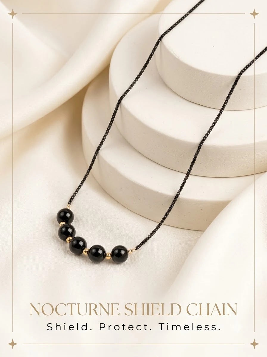 Nocturne Shield Chain black boxer chain with black obsidian beads