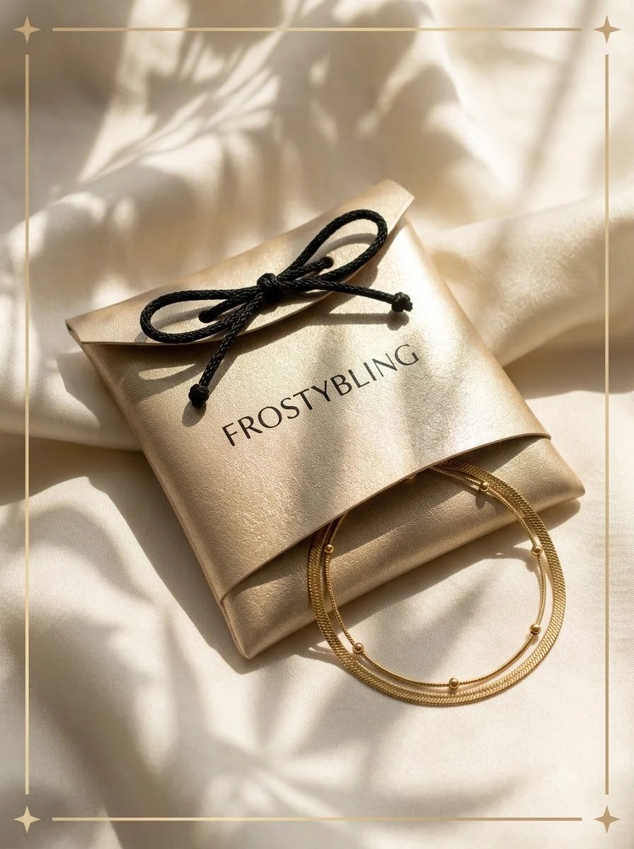 Althea Dual Bracelet in the Frosty Bling champagne-gold gift pouch