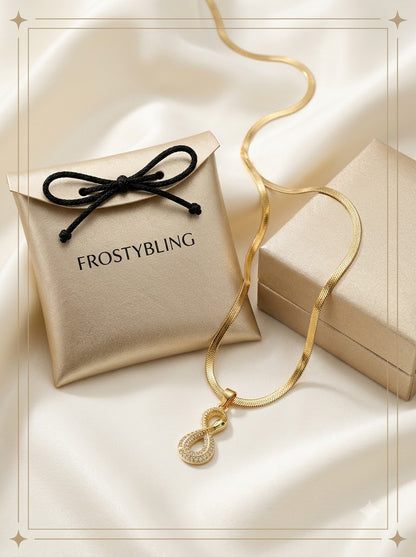 Ourovia Serpent Pendant in the Frosty Bling champagne-gold gift pouch