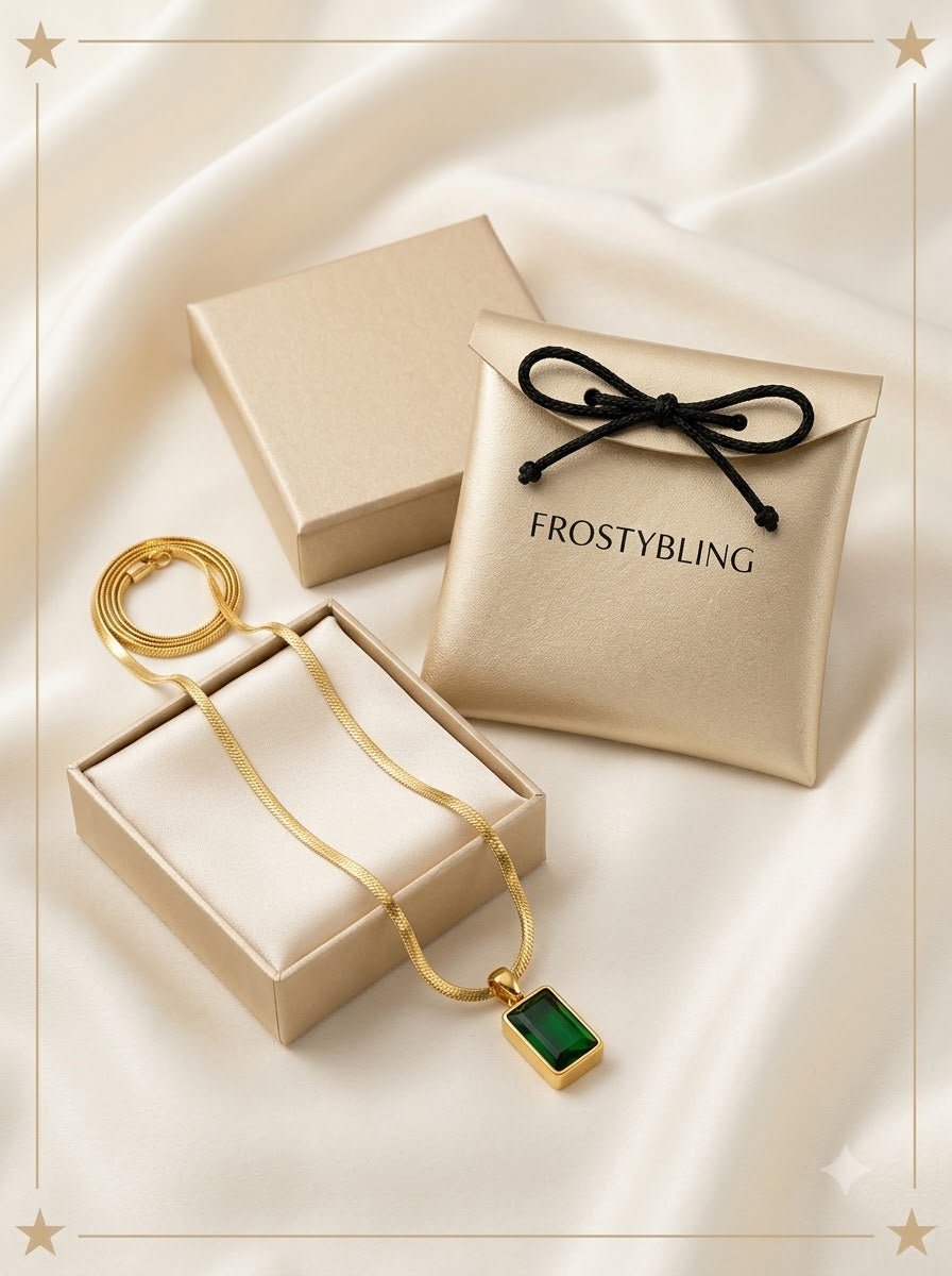 Verdelle Emerald Pendant in the Frosty Bling champagne-gold gift pouch