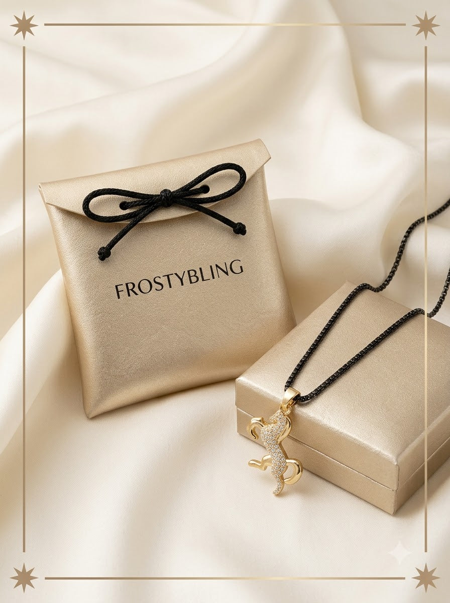 Noire Stallion Pendant in the Frosty Bling champagne-gold gift pouch