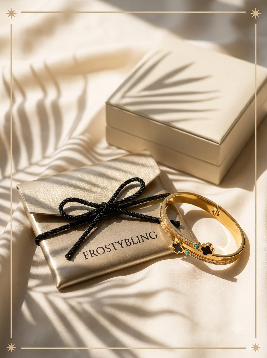 Azurelle Clover Bangle in the Frosty Bling champagne-gold gift pouch