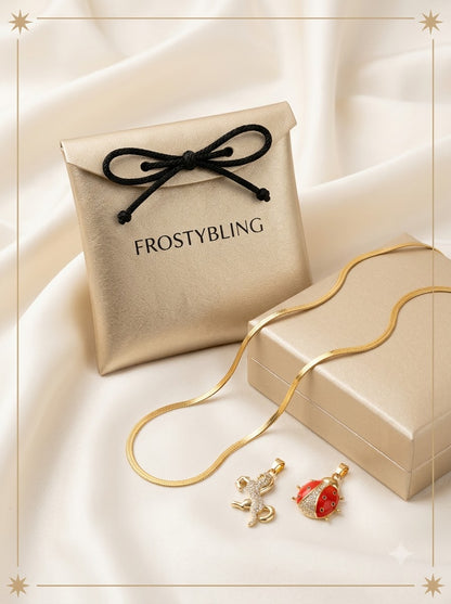 Equara and Luminara Duo Set in the Frosty Bling champagne-gold gift pouch