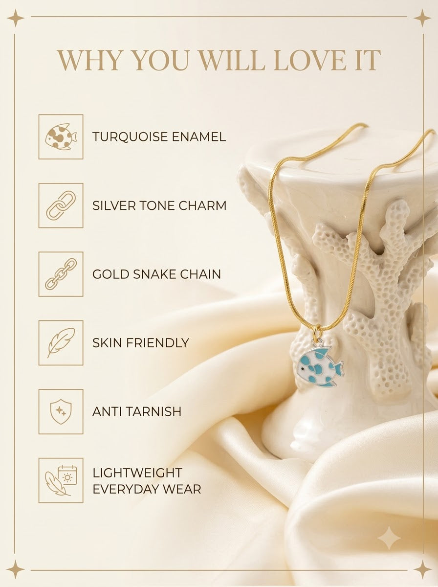 Marisol Fish Pendant features: turquoise enamel, silver tone charm, gold snake chain