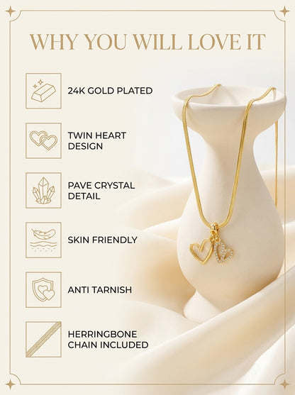 Amoris Twin Heart Pendant features: 24k gold plated, twin heart design, pave crystal detail