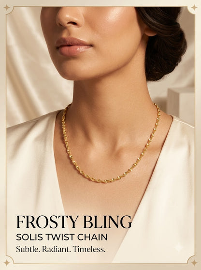 Female model wearing the Solis Twist Chain gold twisted necklace