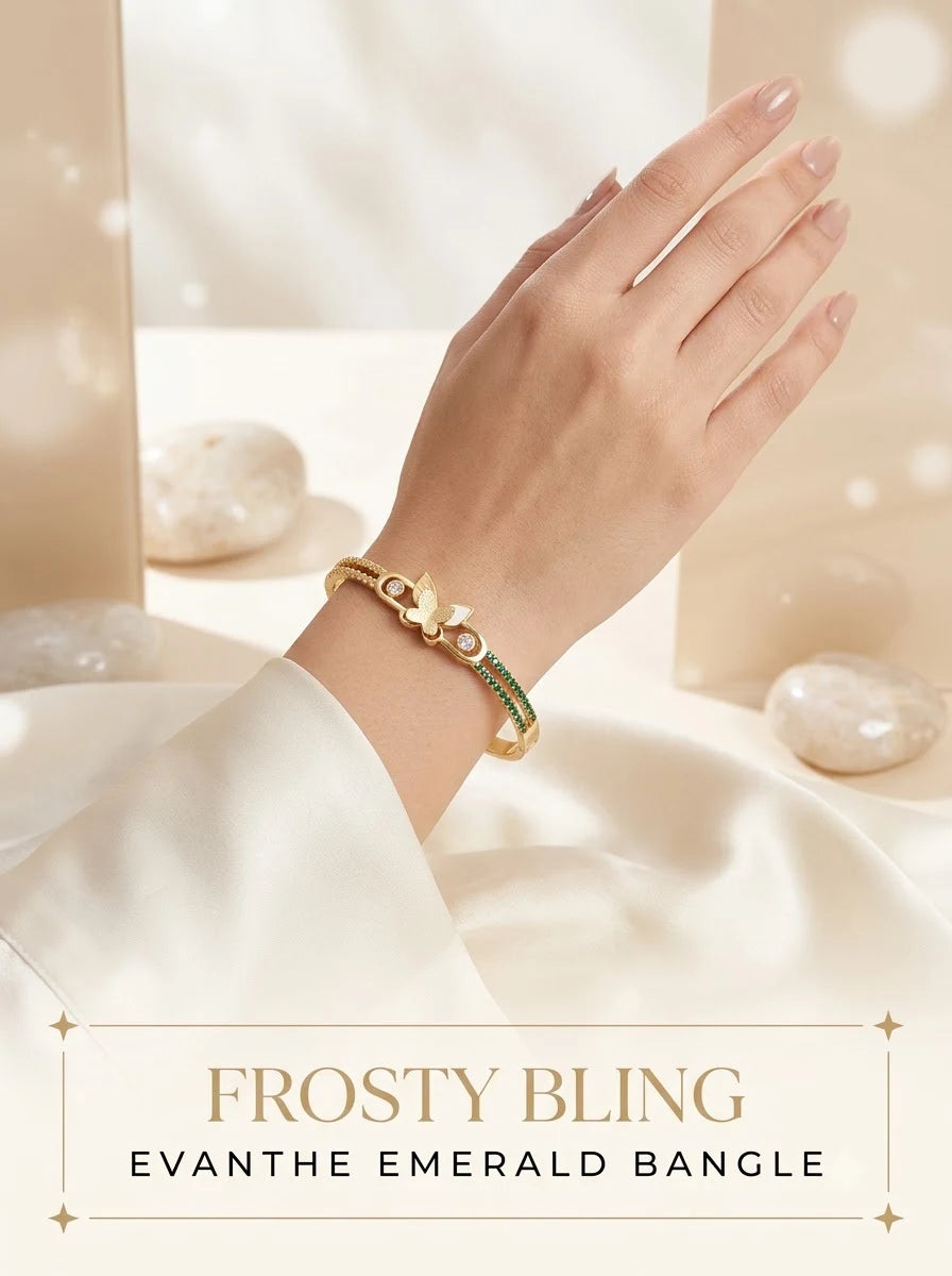 Female model wearing the Evanthe Emerald Bangle on the wrist