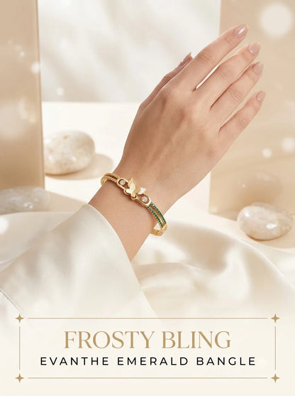 Female model wearing the Evanthe Emerald Bangle on the wrist