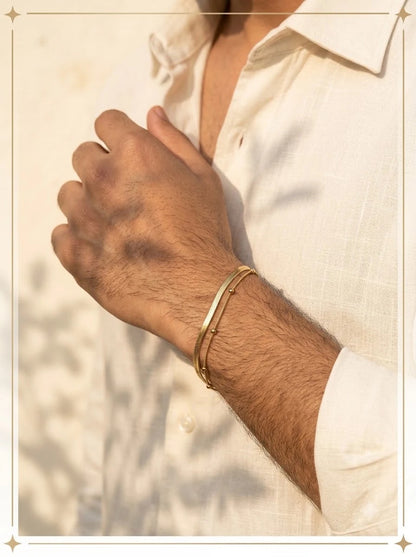 Male model wearing the Althea Dual Bracelet on the wrist