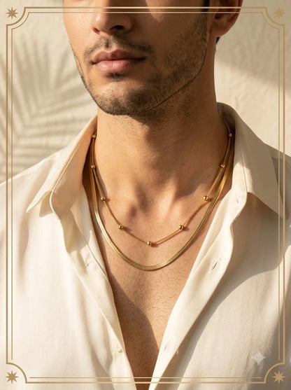 Male model wearing the Syrenne Dual Chain layered gold necklace