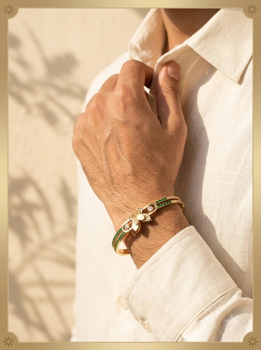 Male model wearing the Evanthe Emerald Bangle on the wrist