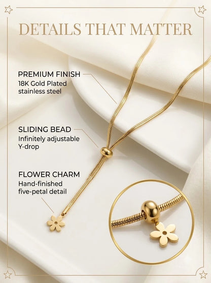 Florelle Lariat detail: sliding bead and hand-finished five-petal flower charm