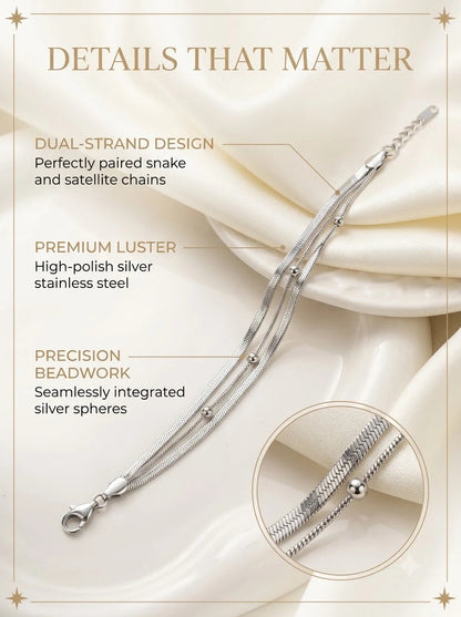Thalassa Dual Bracelet detail: paired silver snake and satellite strands