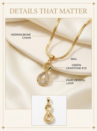 Ourovia Serpent Pendant detail: green gemstone eye, pave crystal loop, bail and herringbone chain