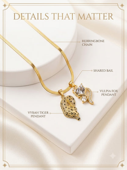 Vulpia and Vyrah Duo Set detail: tiger pendant, fox pendant, shared bail and herringbone chain